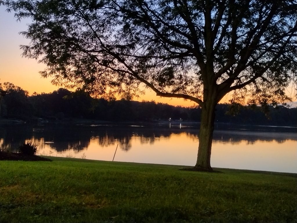 Photo of a sunrise over Wyoga Lake.